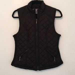 Women’s black puff vest